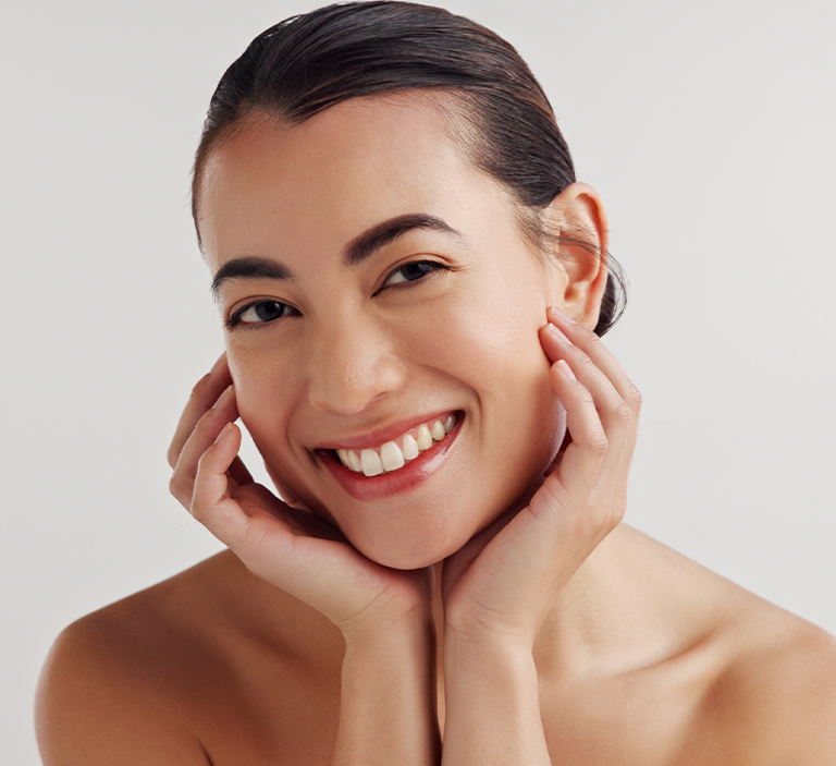 a woman smiling for the camera