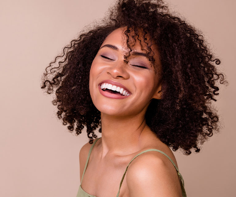 a woman smiling for the camera