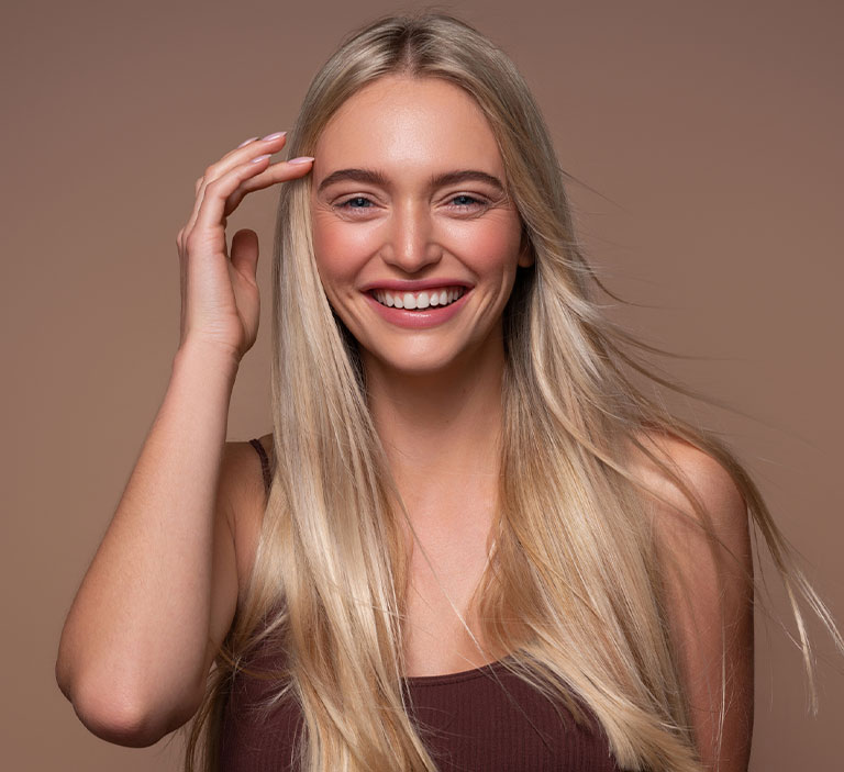 a woman smiling for the camera