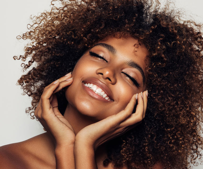 a woman smiling for the camera